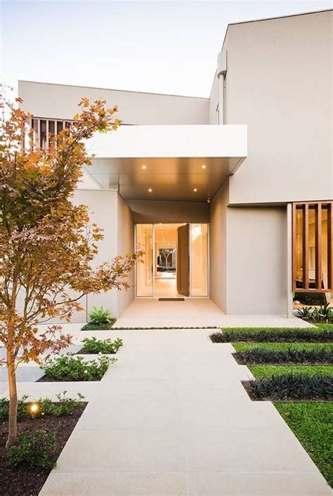 Multicolor wood paneled exterior walls adds a neutral, craftsman look alongside the bright blocks of color. 30 Modern Entrance Design Ideas for Your Home | Entrance ...