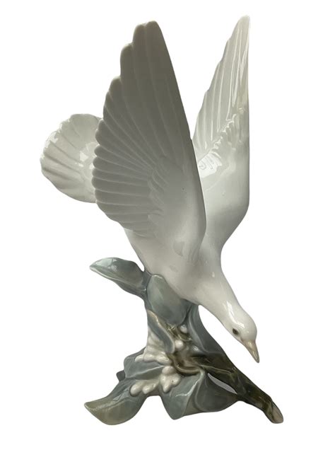 Lladro Figure Modelled As White Dove Perched Upon A Branch Collectors