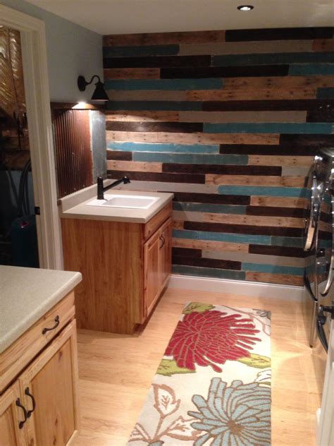 Red brick wall kitchen simple stainless steel shelving design for. Finished the laundry room with a rustic painted pallet wall, rusty corrugated steel backsplash ...