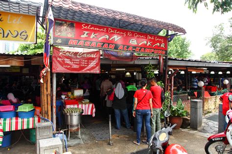 You could take some dishes from the rows and rows of dishes (frequently replenished) to go with your ikan bakar. Gerai Pak Lang Ikan Bakar @ Kampung Baru