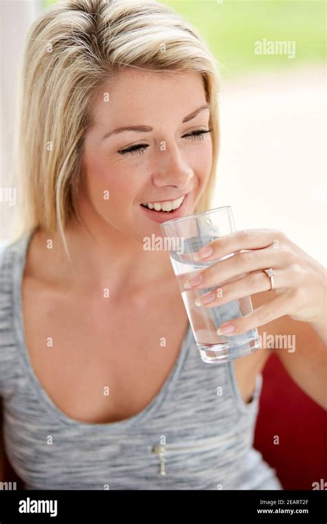 Woman Drinking Water Stock Photo Alamy