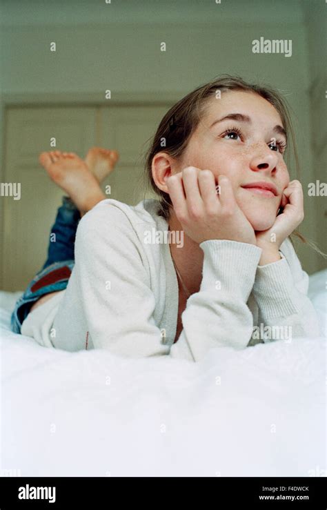 A Teenage Girl Laying Down Stock Photo Alamy