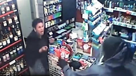 A Cctv Footage Shows A Fearless Cashier Confronts A Would Be Robber With Her Own Blade In