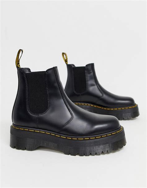 They often have a loop or tab of fabric on the back of the boot, enabling the boot to be pulled on. Dr Martens 2976 Quad platform chelsea boots in black | ASOS