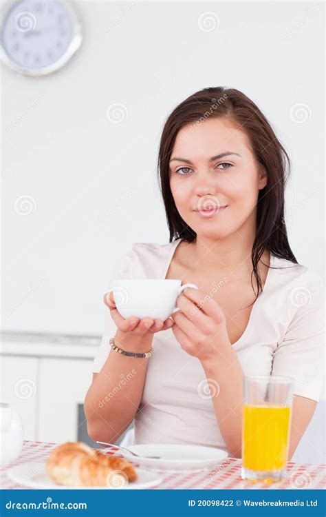 Portrait Of A Cute Brunette Having Her Breakfast Stock Photo Image Of