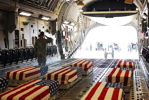 Flag Draped Coffins Of Five Us Soldiers Photograph By Everett Pixels