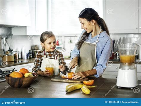 Daughter Helping Mom In Preparing Food Stock Image Image Of Breakfast
