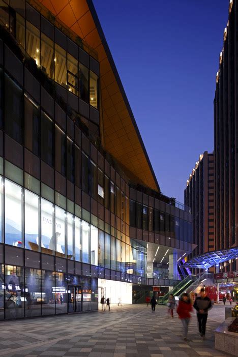 Spark Incorporates Giant Screens Into Faceted Shopping Centre Facade