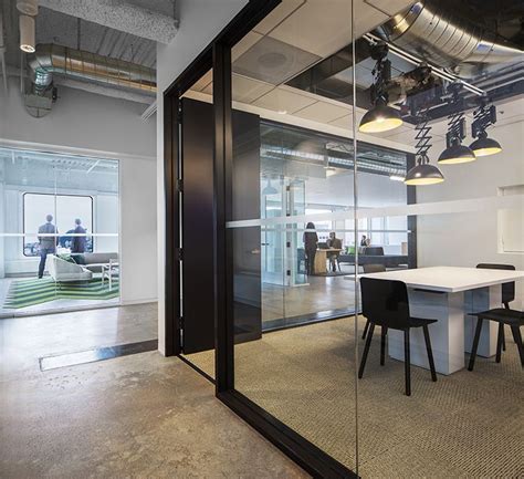 Private Meeting Room With Glass Wall System Allows Daylight To