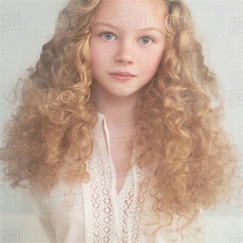 Caucasian Teenage Girl With Curly Hair Stock Photo Dissolve