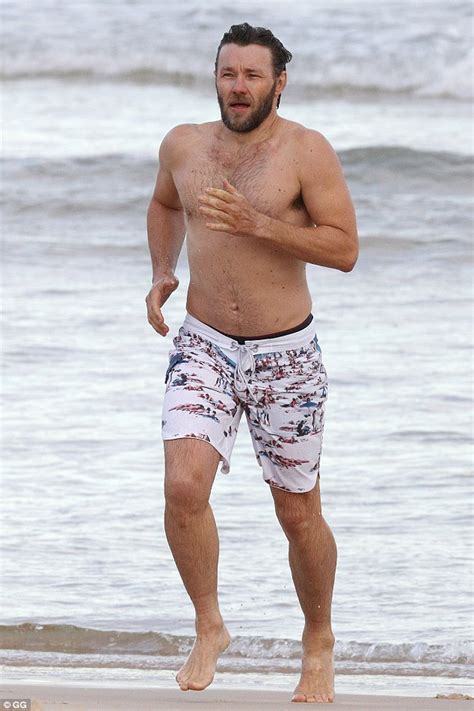 Joel Edgerton Shirtless As He Strips Down To Swimming Trunks At Bondi