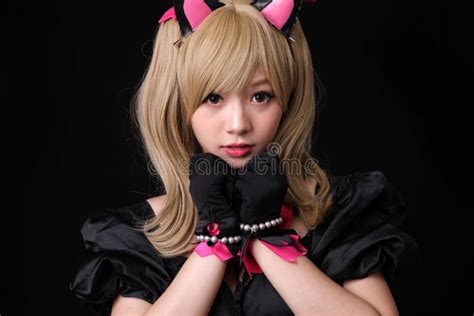 Portrait Of Japan Anime Cosplay Girl Isolated In Black Background Stock
