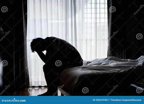 Lonely Man Silhouette Feeling Depressed And Stressed Sitting Head In