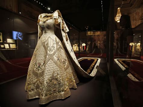 She was dressed in white silk. Queen Elizabeth II's coronation regalia on display - Photo ...