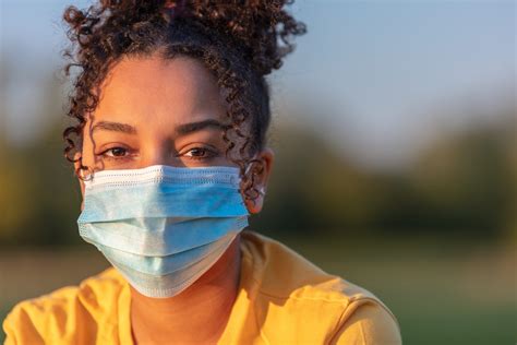 African American Teenager Girl Woman Wearing Coronavirus Covid 19 Face
