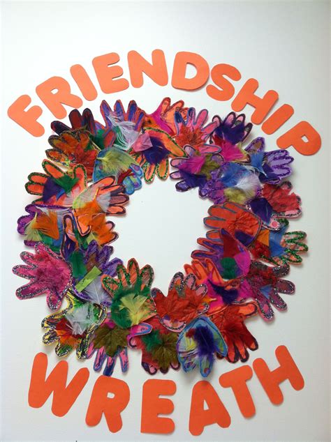 A Wreath Made Out Of Handprints With The Words Friends And Wreath