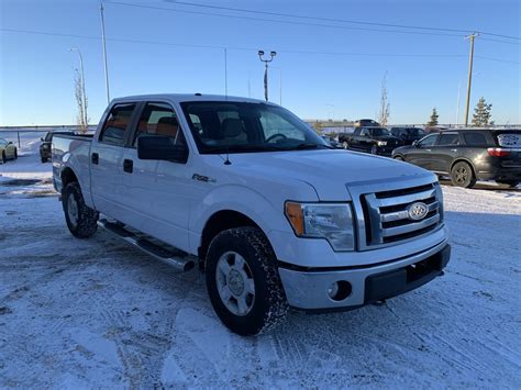 Pre Owned 2009 Ford F 150 4wd Crew Pick Up 145 Xlt Truck In Calgary Ps