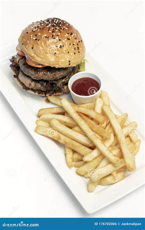 Beef Burger With French Fries Platter On White Table Stock Photo