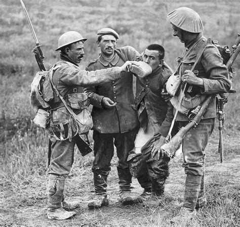 A British Soldier Gives A German Soldier A Drink Circa 1915 World War