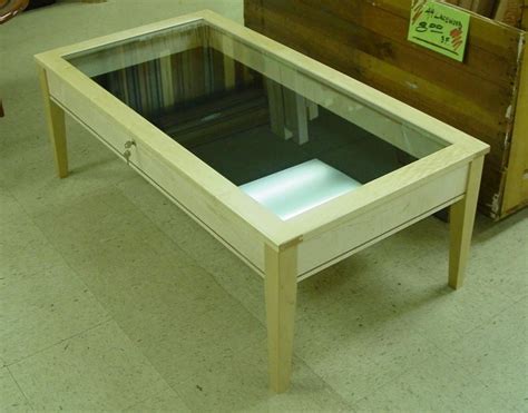 An additional shelf beneath provides extra storage. Shadowbox Coffee Table | Shadow box coffee table, Shadow ...