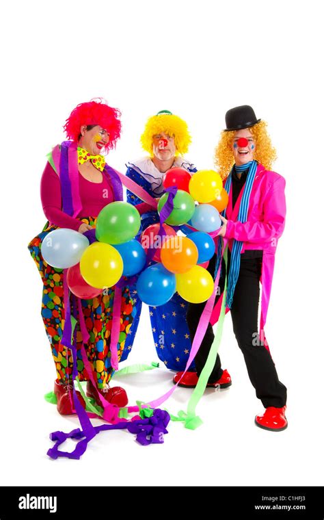 Happy Clowns Are Having A Celebration With Balloons Stock Photo Alamy