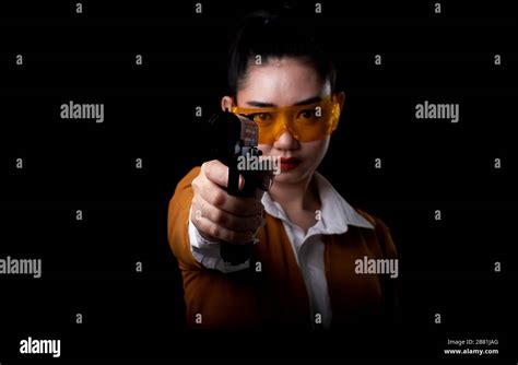 Women Pointing Gun At Camera