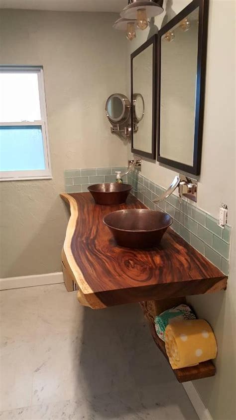 Pull out waste containers or space for seating. Custom live edge slab wood floating bathroom vanity ...