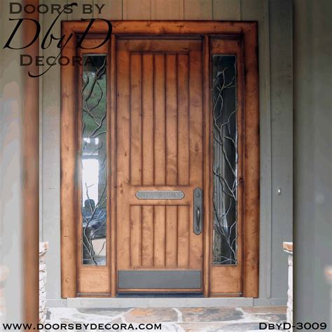 Custom Rustic V Groove Door With Iron Grill Entry Doors By Decora