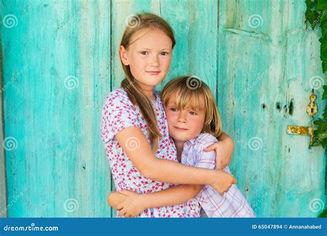 Outdoor Portrait Of Two Adorable Kids Stock Photo Image Of Attractive
