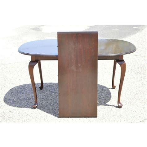 An exceptional queen anne style cherry wood tilt top pedestal breakfast table or dining table by eldred wheeler usa, late 20th century measures: Ethan Allen Georgian Court Cherry Wood Queen Anne Oval Dining Table 1 Leaf | Chairish