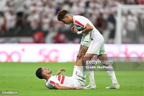 Emam Ashour Of Zamalek Helps Ahmed Abou El Fotouh With Cramp During