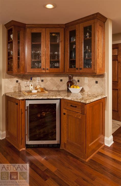 All our products are made using sustainable materials and technology. Custom bar features water glass in the upper doors ...