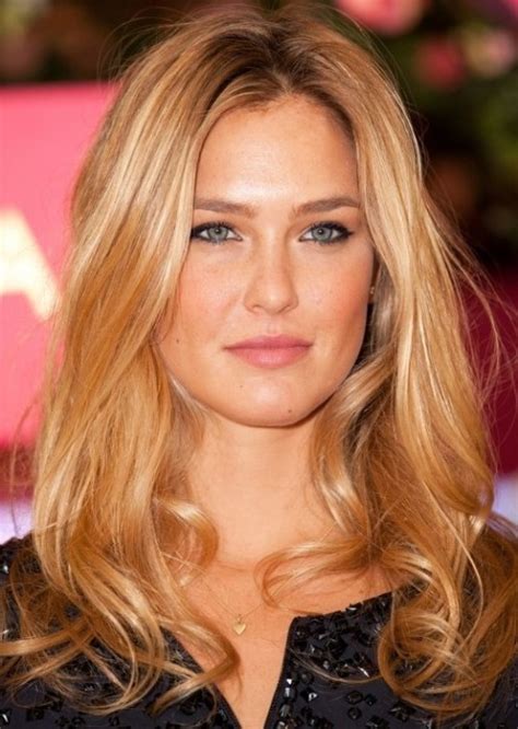 A woman with pale yellow or gold hair: Blonde Highlights | All You Need To Know About Highlights