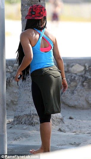 Christina Milian Flashes Some Serious Curves During A Beach Workout Before Hitting The Streets