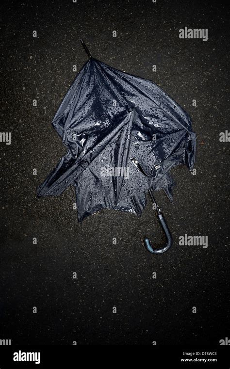 Broken Umbrella On Ground Hi Res Stock Photography And Images Alamy