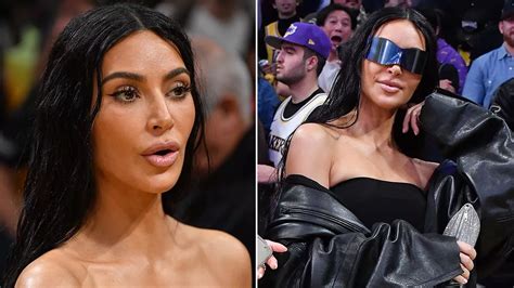 why kim kardashian is always hiding her face as fans suspect botched plastic surgery the
