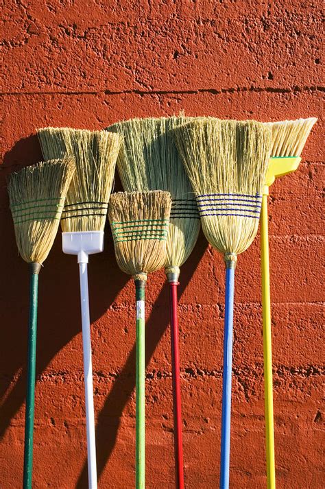 Brooms Leaning Against Wall Photograph By Garry Gay