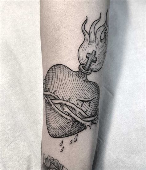 Sacred Heart Tattoo Inked On The Arm Sacred Heart Tattoos Hand