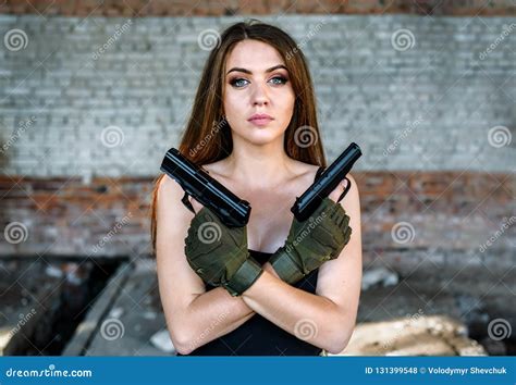 Portrait Of Beautiful Girl With Two Guns Stock Photo Image Of