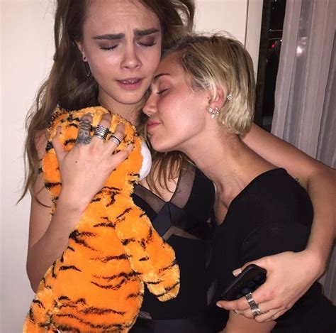 Has Miley Cyrus Moved On Already Singer Pictured Kissing Female Model Metro