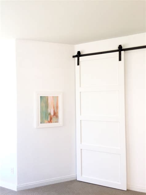 But besides that, our new modern barn door is complete! DIY barn door - modern shaker style, White Moderne Barn ...