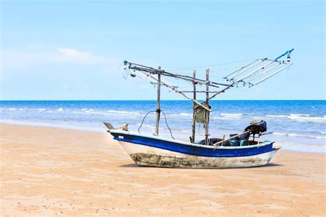Free Photo Traditional Fishing Boat On The Beach