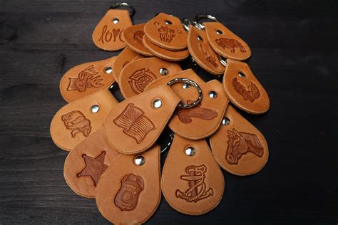 Custom Leather Keychain With Various 3d Stamps In Two Colors