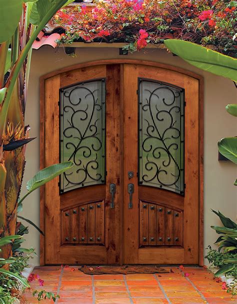 Add architecturally authentic elements to your wood entry door. Mediterranean Front Doors