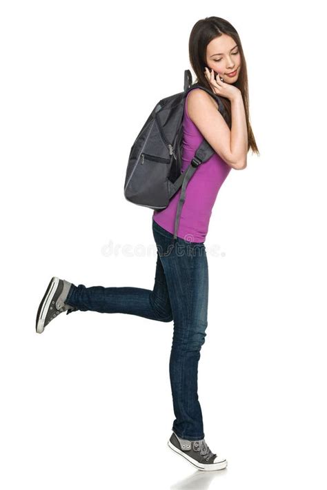 casual teen girl wearing backpack talking on cell phone royalty free stock image image 31827566