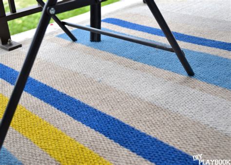 Fluffy grunge striped weave rug, mat, carpet, coverlet ,tapestry in yellow, green, orange pastel colors isolated on white. How to Paint This DIY Outdoor Rug in Three Easy Steps ...