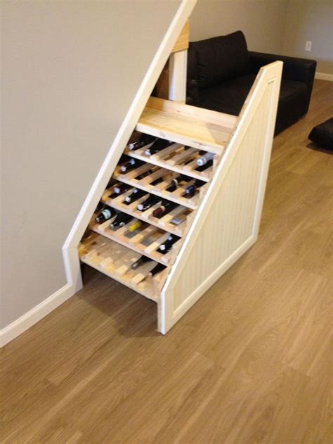 However, if you have more than three or four bottles on your wine rack white wine that is stored in clear bottles is especially susceptible to direct sunlight because the glass offers less protection than darker bottles. 12 best wine rack under stairs images on Pinterest ...