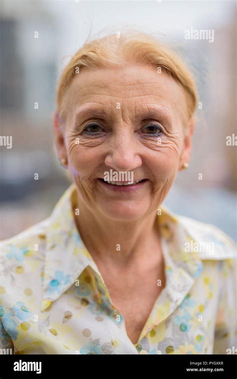 Happy Beautiful Senior Woman Smiling Outdoors In City Stock Photo Alamy