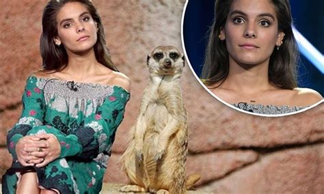 Caitlin Stasey Posts Bizarre Snap Of Herself With A Meerkat On