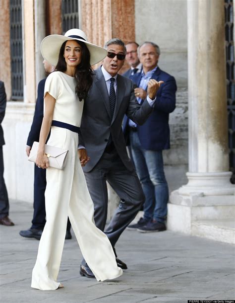 As the new mr and mrs clooney made their first appearance as man and wife on sunday there was a chance for celebrity fans to get the first glimpse of the special rings which sealed their love. Amal Alamuddin Wears Chic Pantsuit For Civil Ceremony With ...